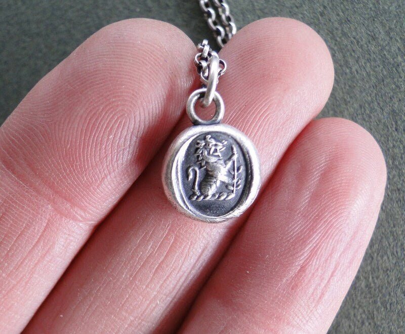 Sterling silver lion on sale pendant