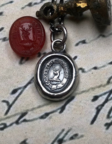 Vincit veritas, truth prevails. Antique wax letter seal pendant. Sterling silver victorian seal impression.